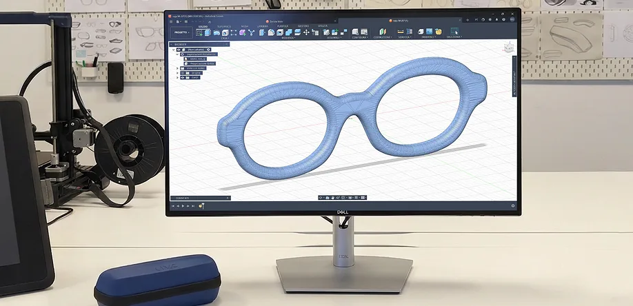 Digital eyewear design displayed on a workstation